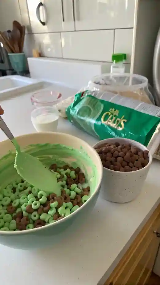 Cereal coated in green chocolate mixture