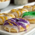 Colorful Mardi Gras King Cake Cookies with glaze and festive sugar