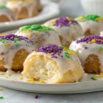 Mini king cake bites with glaze and colorful sprinkles